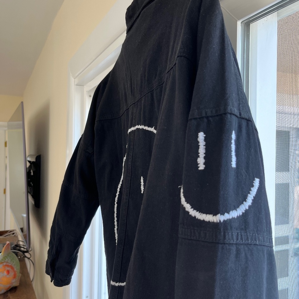 Women’s black smiley face embroidered jacket